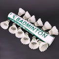 White nylon badminton shuttlecocks in a 12-piece pack on a bright background