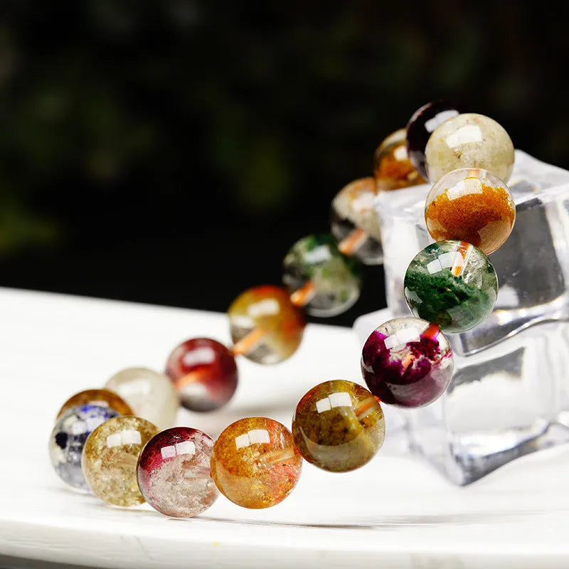 Colourful crystal bracelet with 10mm ball beads showing ghost cornucopia design in ethnic style