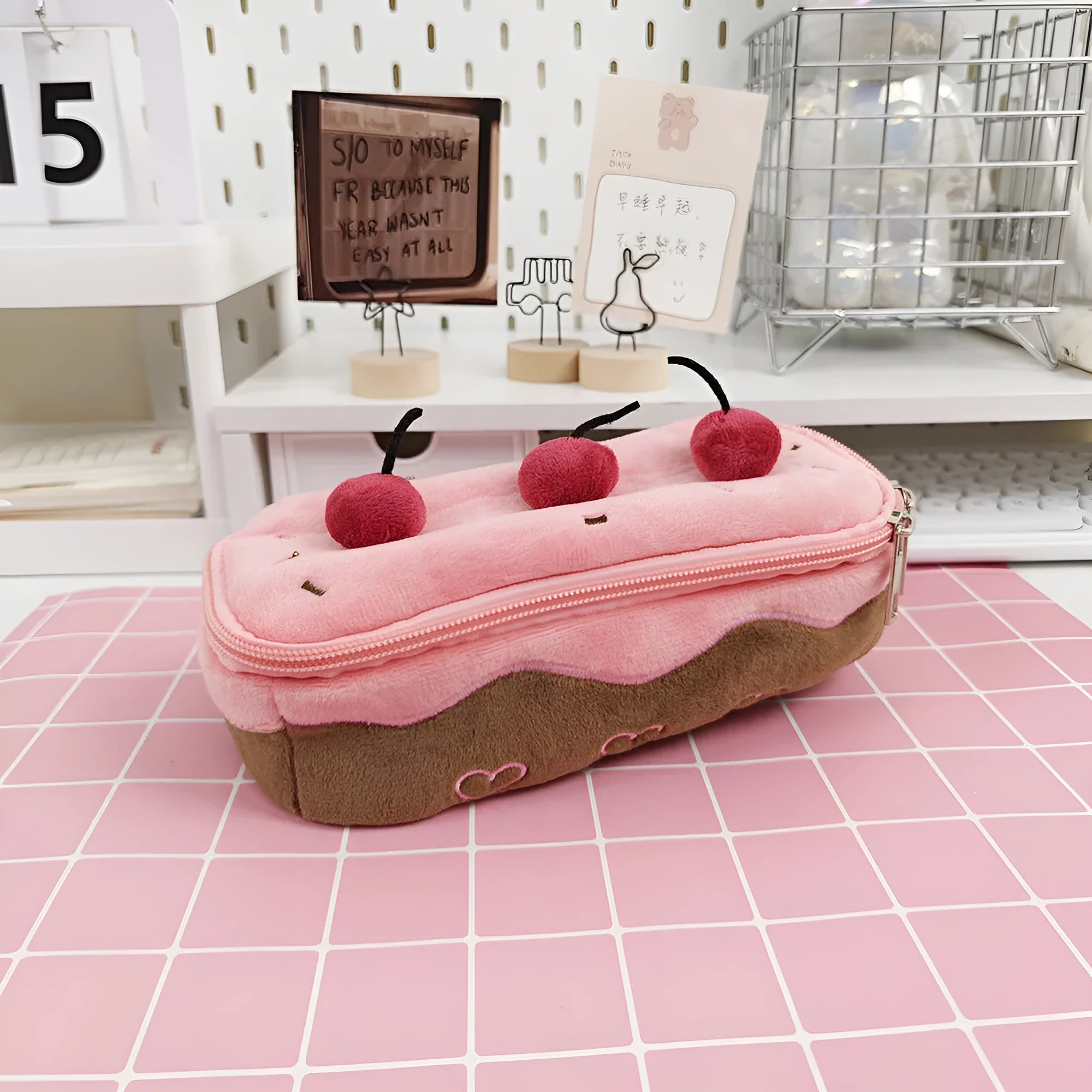 Cherry cake coloured velvet plush pencil bag with a zip, shown in Korean style.