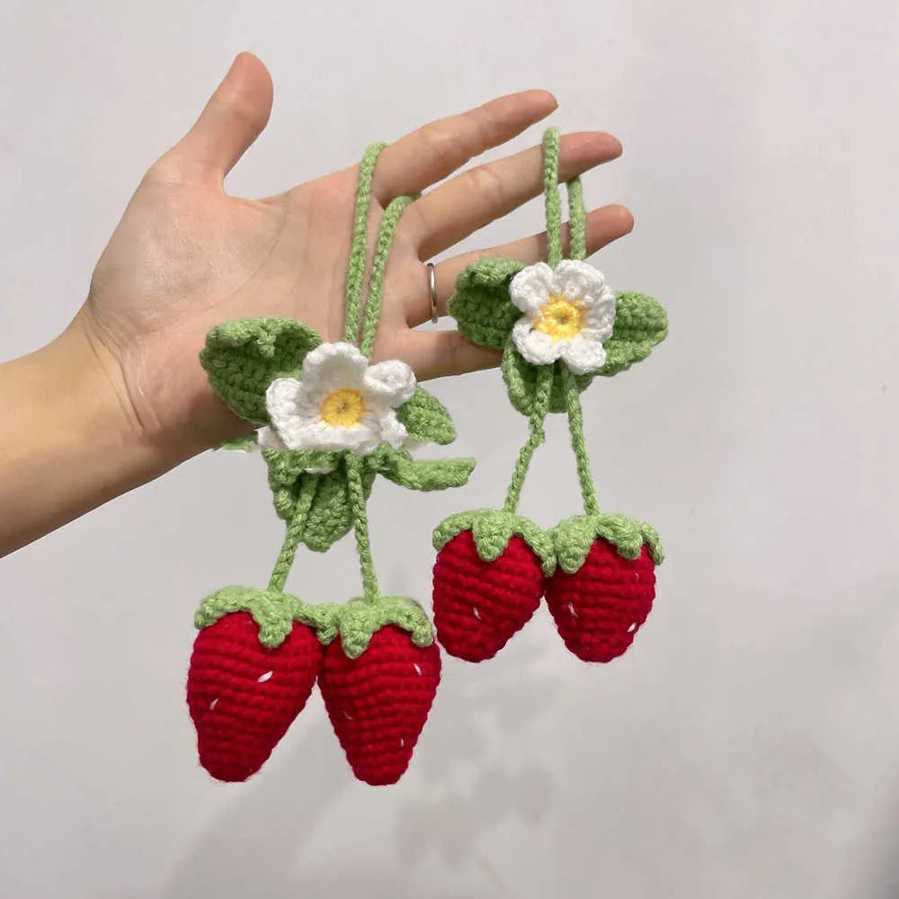 Handmade woven strawberry car pendant made from cotton and hemp knitting wool.