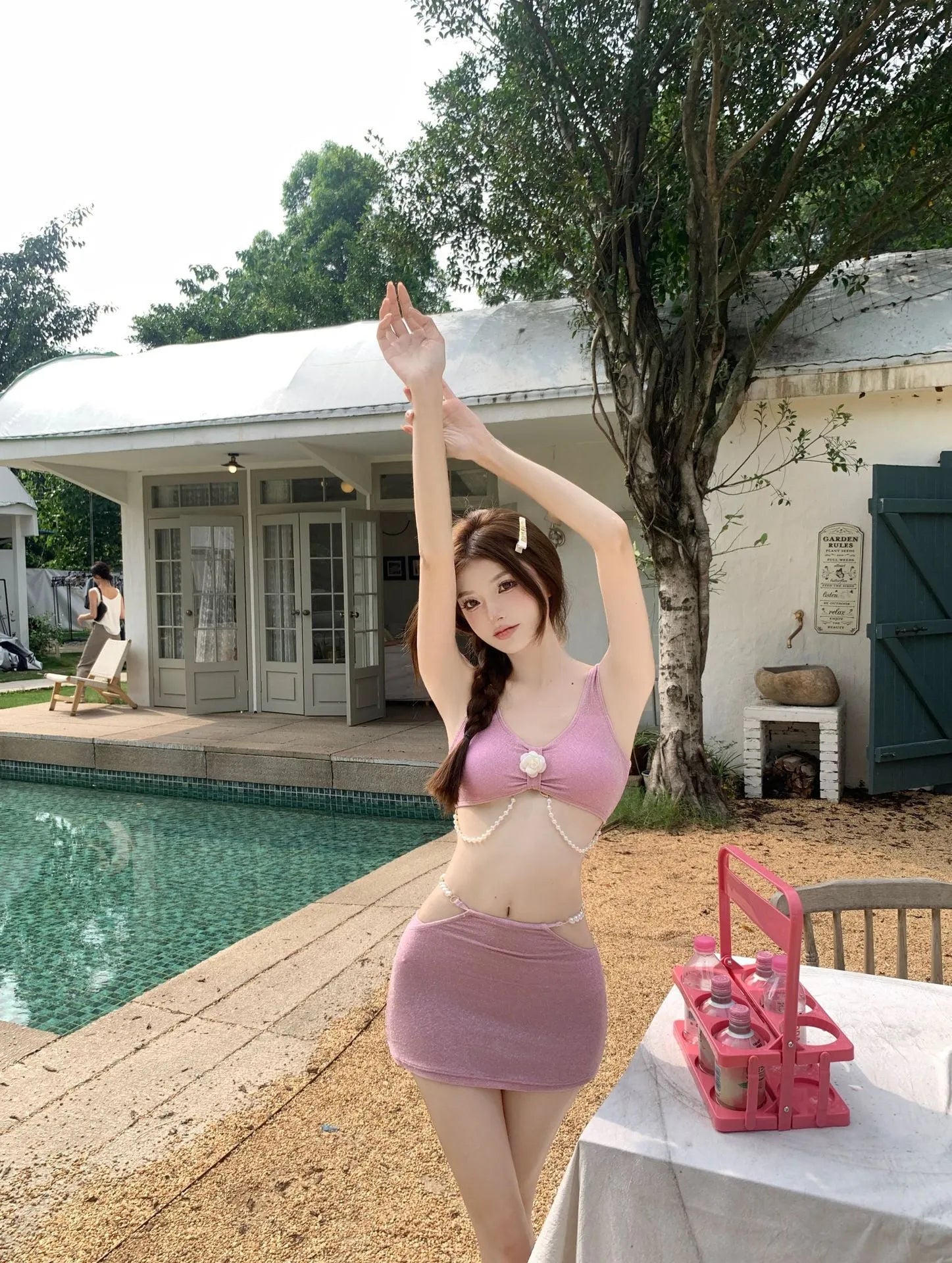 Bear Vacation three-piece polyester bikini set in pink and black colours with briefs style for swimming