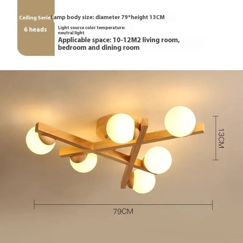 Wooden style modern Nordic ceiling light with three neutral light heads.