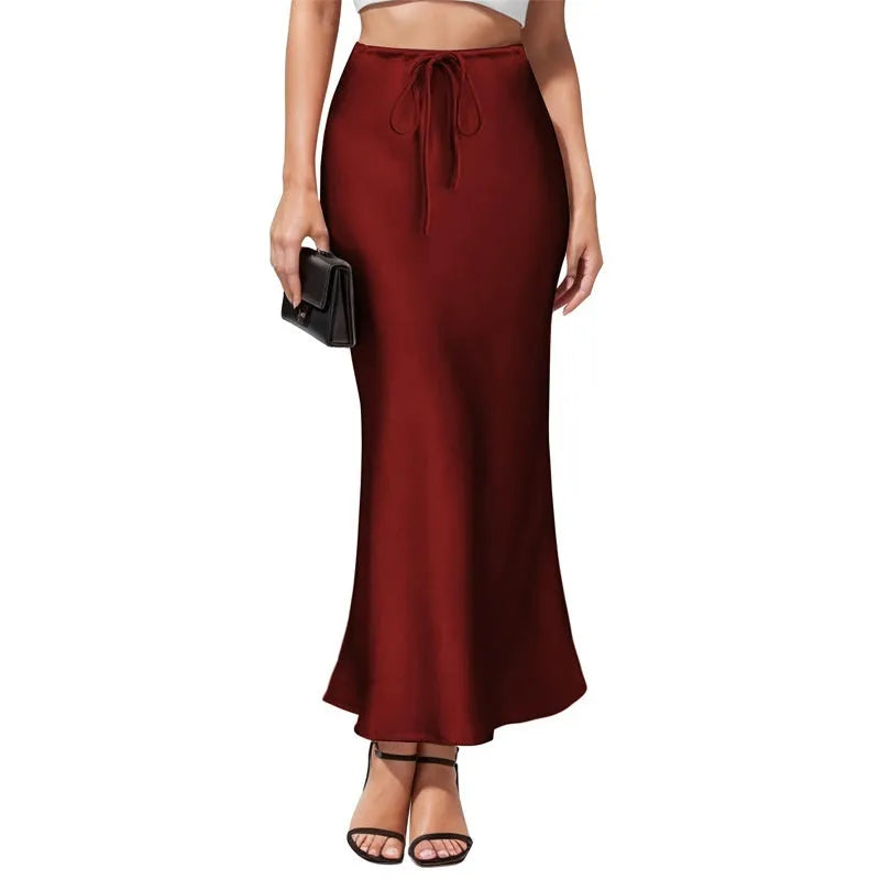 Asymmetric high-waist acetate satin skirt with irregular stitching in milky white