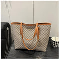 PU material shoulder bag in street-trend style with sewing thread detail, shown in black.