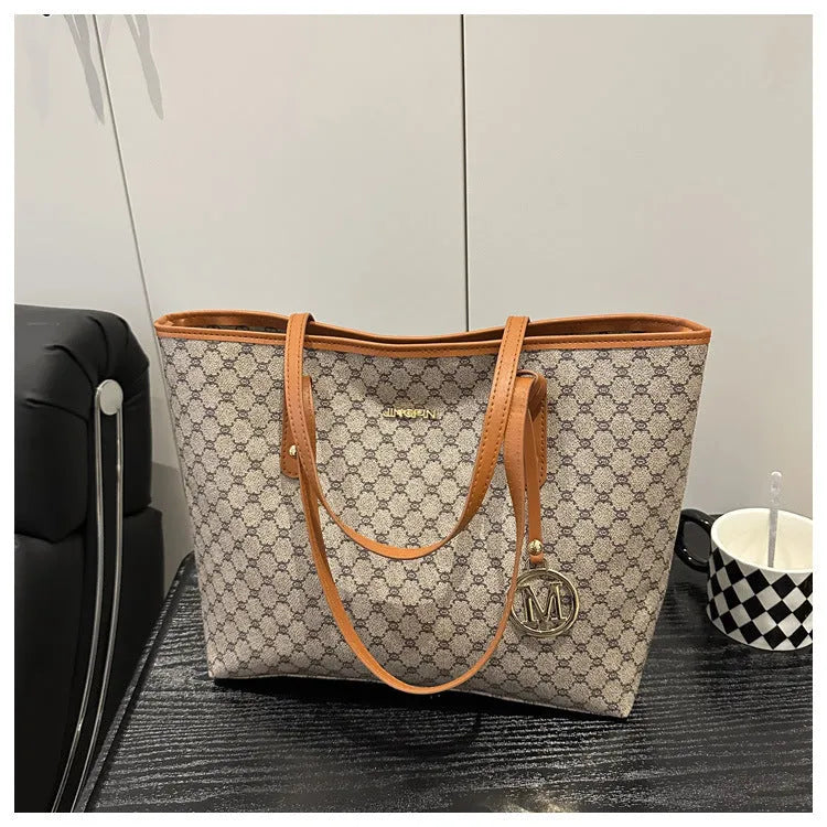 PU material shoulder bag in street-trend style with sewing thread detail, shown in black.