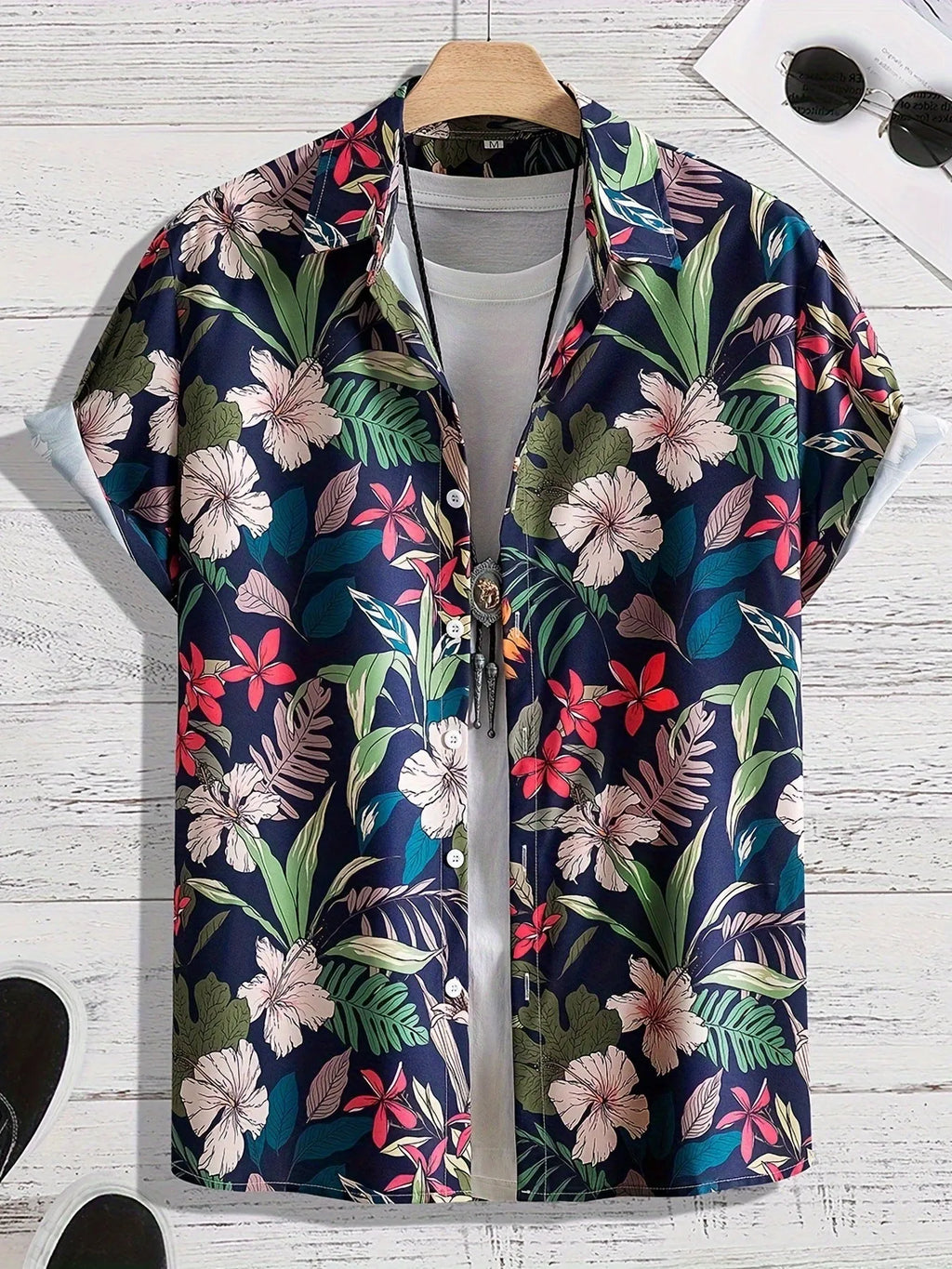 Man wearing loose fit floral print short sleeve shirt with cardigan style