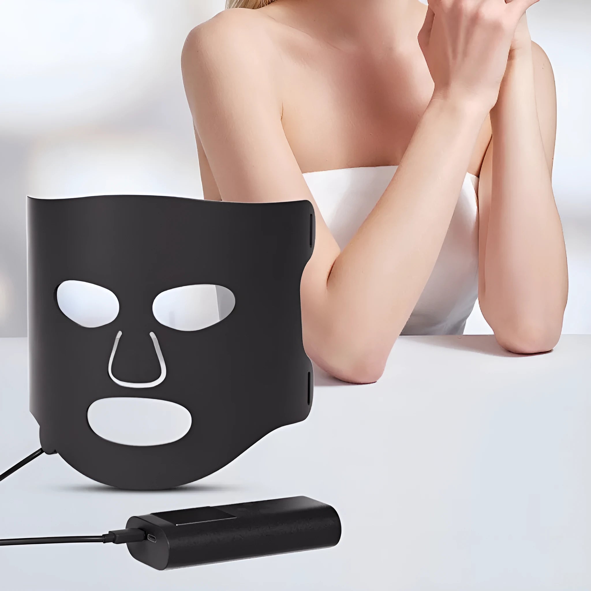Black and white LED phototherapy face mask with seven colour light modes for home skin treatment