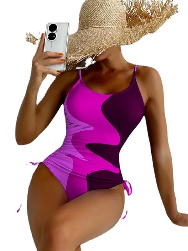 Women's sleeveless one-piece swimsuit in printed design with multiple colour options