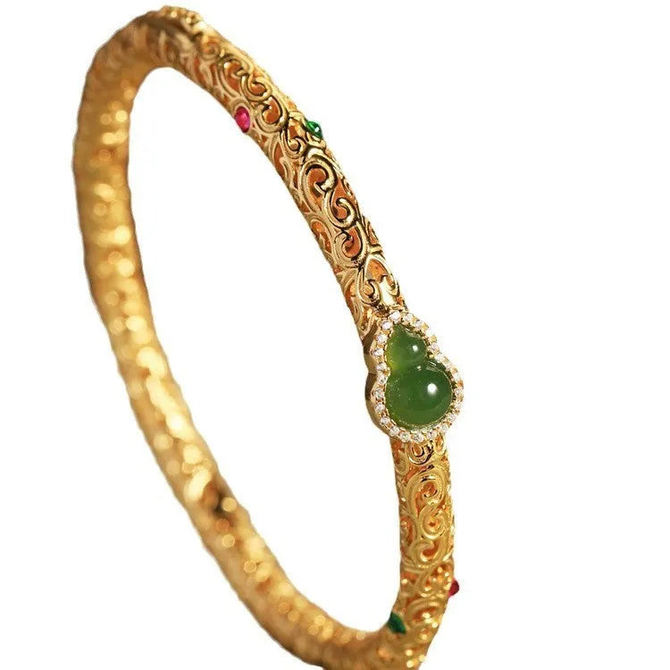 Retro women's bracelet with opening xiangyun gourd charm in gold-plated silk finish on copper base