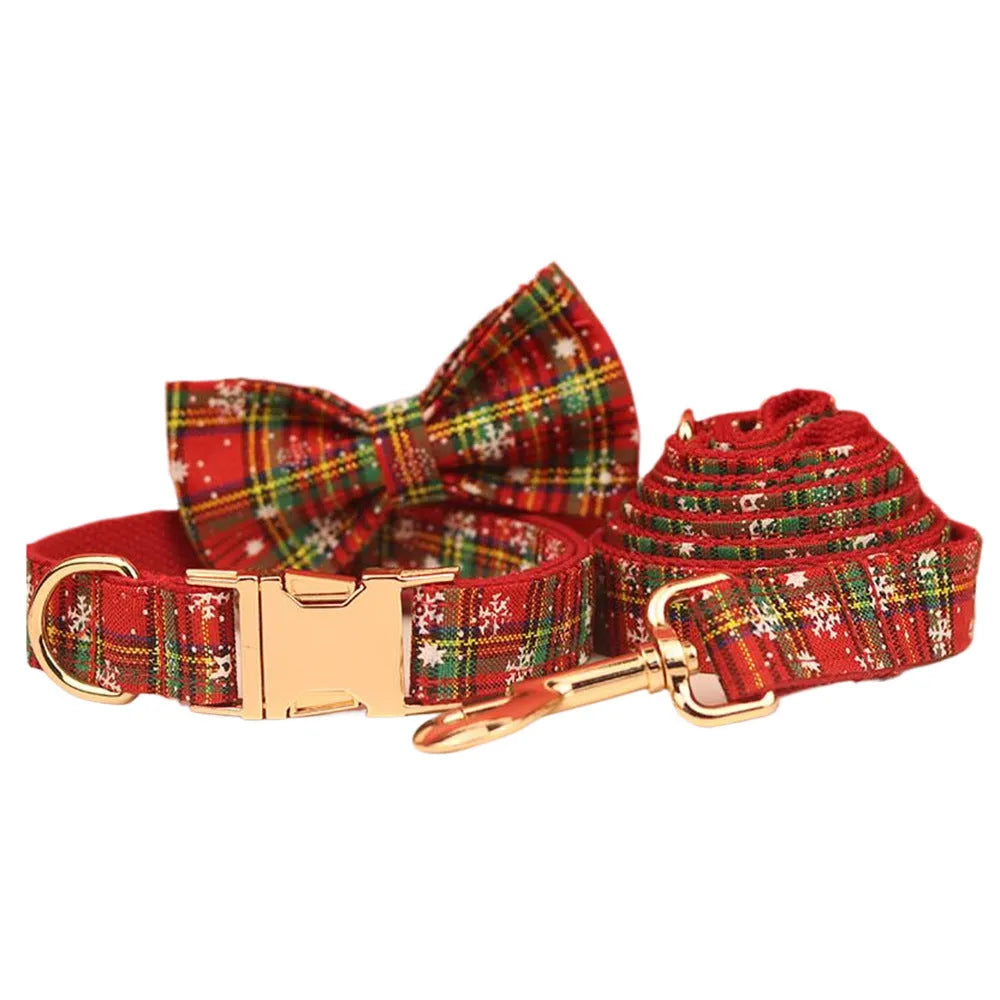 Red snowflake plaid Christmas pet collar and leash set with matching dog vest and decorative bow