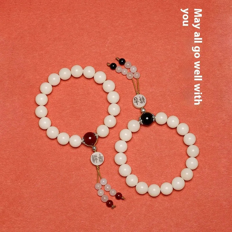 National style Bodhi bracelet with round beads and Ruyi element in black, gold, or red colours