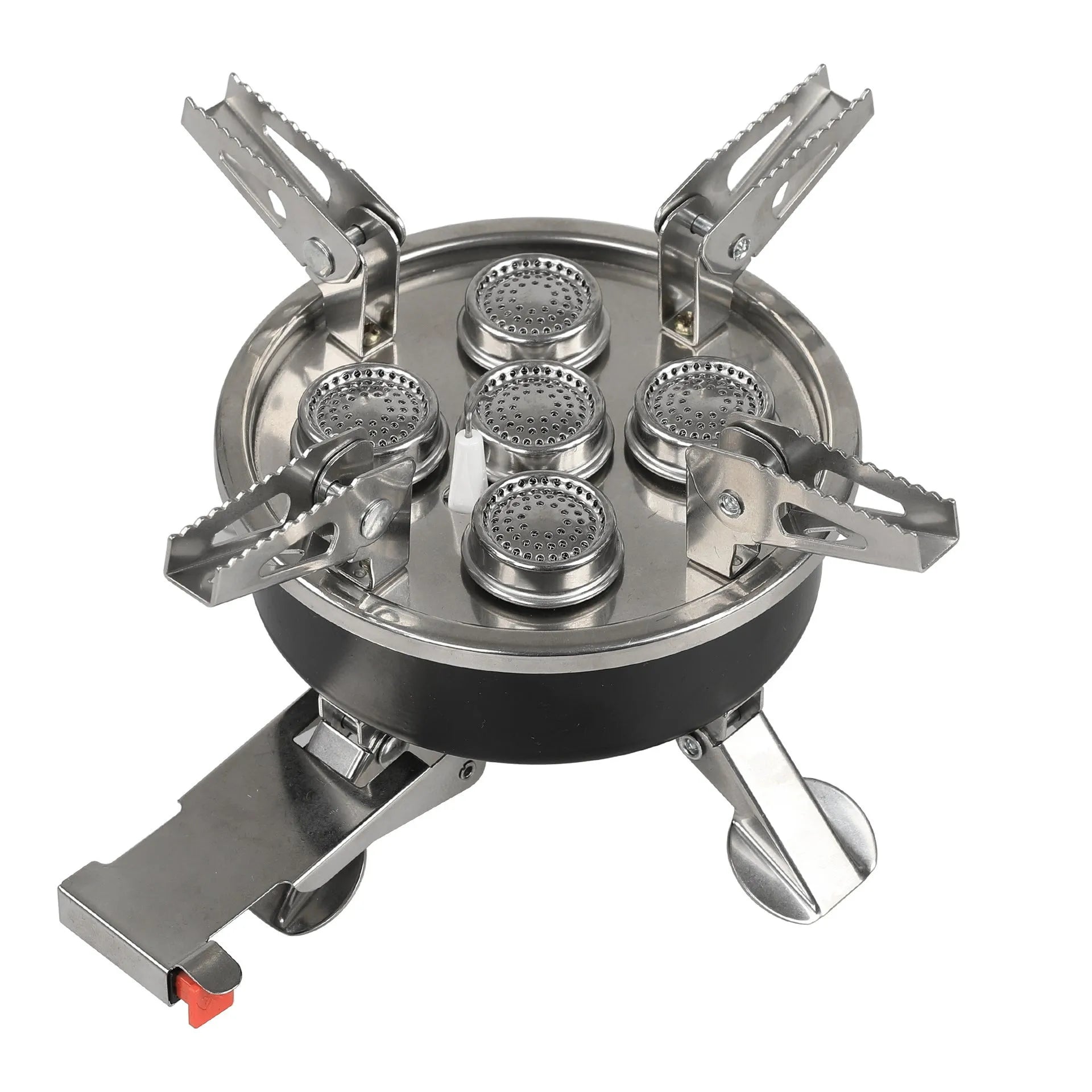 Silver portable split camping stove with foldable legs and a long black hose, on a grass background.