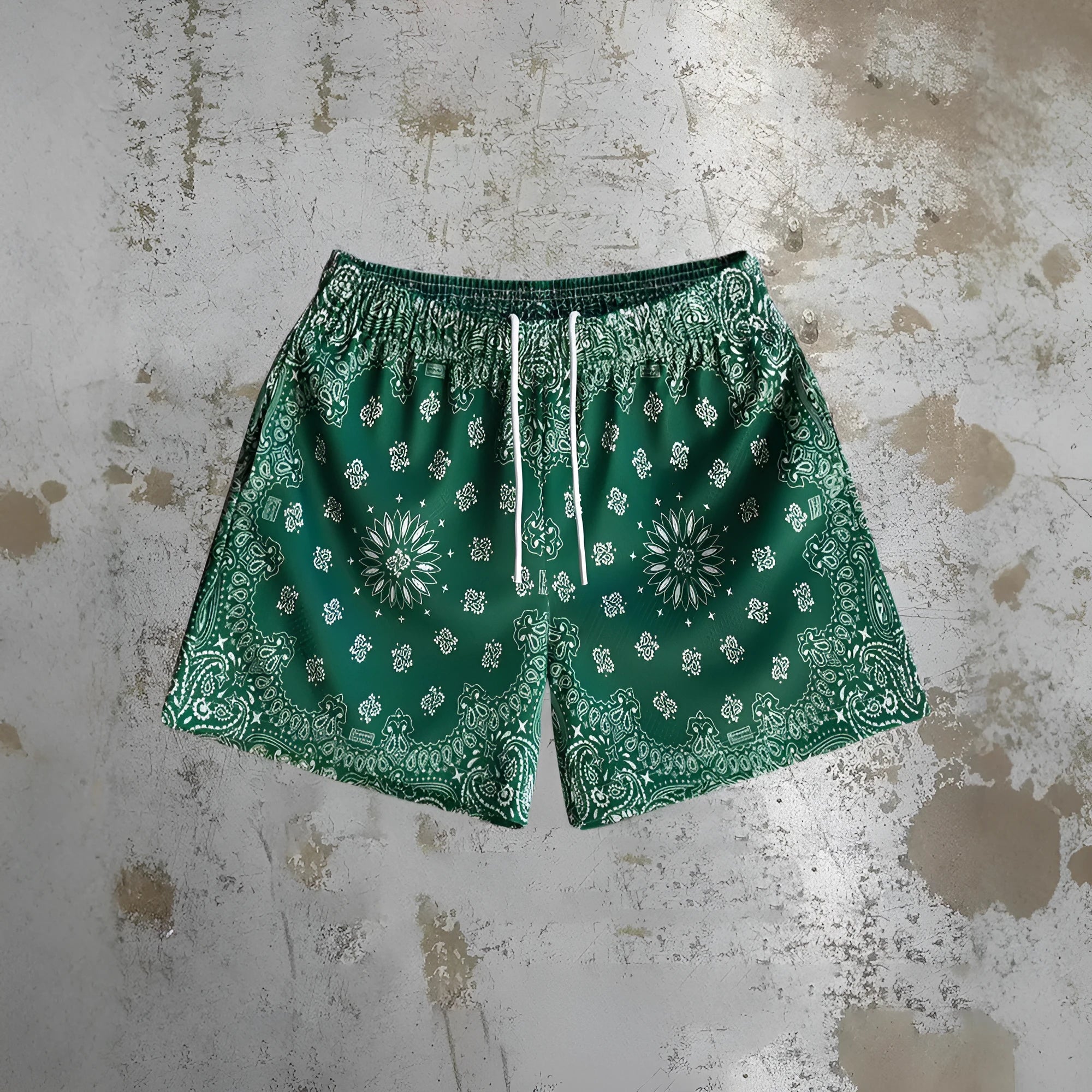 Mens loose fit quick-drying beach shorts with digital print design and elastic waistband in a light colour.