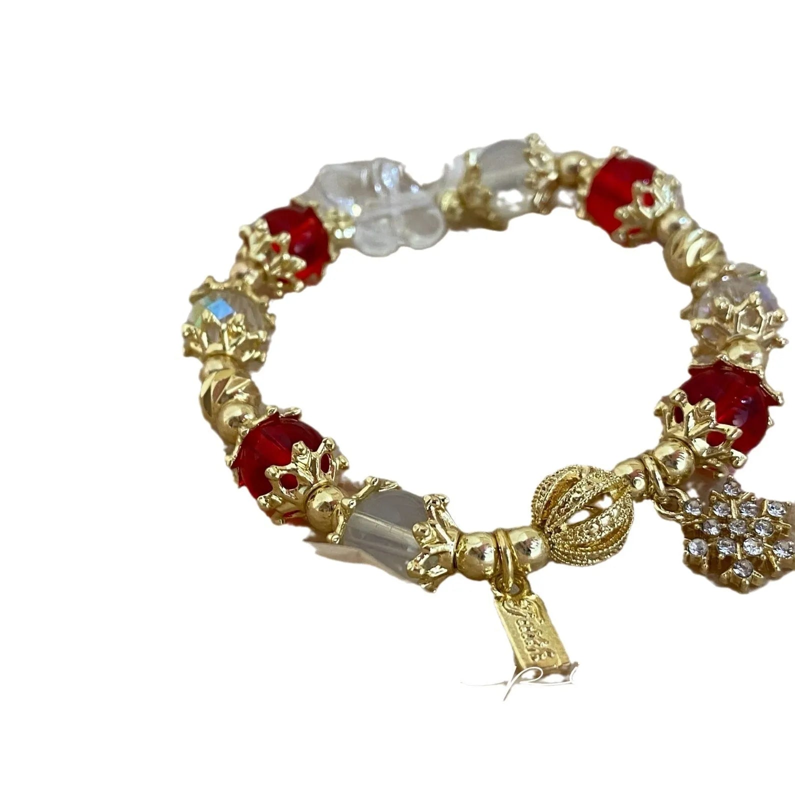 Galaxy-coloured alloy charm bracelet with snowflake, heart, and bow pendants.