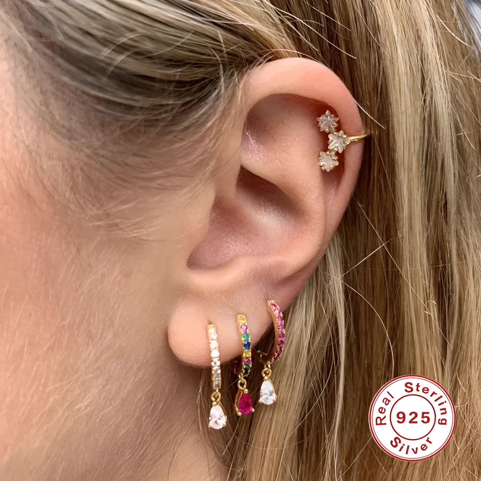 S925 sterling silver water droplet drop earrings with a geometric shape in a gold or silver electroplated finish.