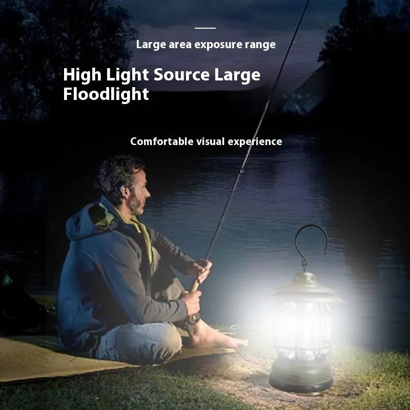 Dark green portable camping head lamp with compact dimensions for outdoor use.