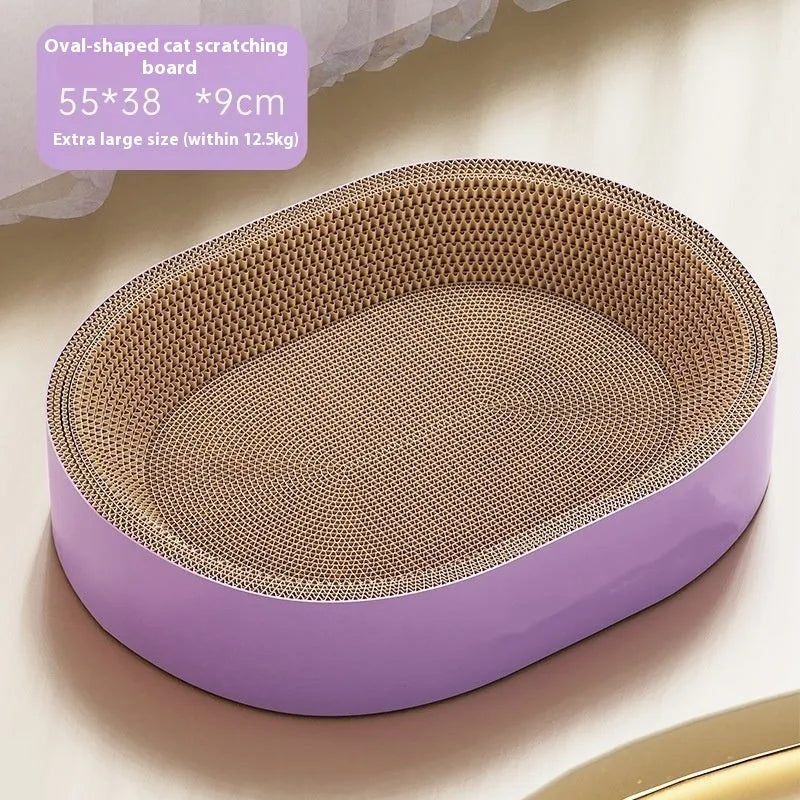 Green oval corrugated paper cat scratch board nest showing textured scratching surface and central bed area.
