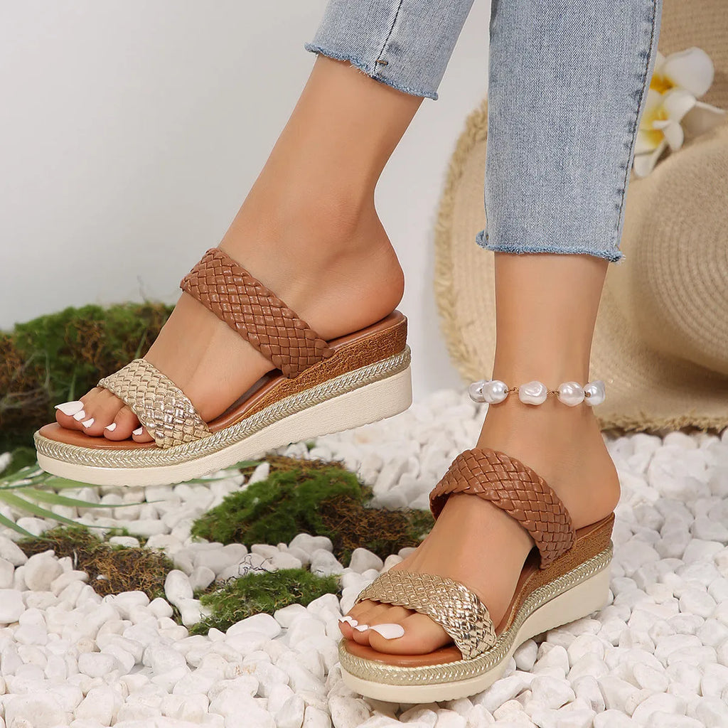 Gold wedge sandals for women with an adjustable ankle strap and a rubber sole.