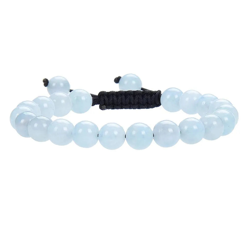 Women's flat knot braided bracelet hand-woven from aquamarine stone with geometric patterns.
