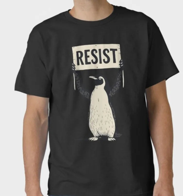 Loose fit cotton summer T-shirt in black, shown on a hanger