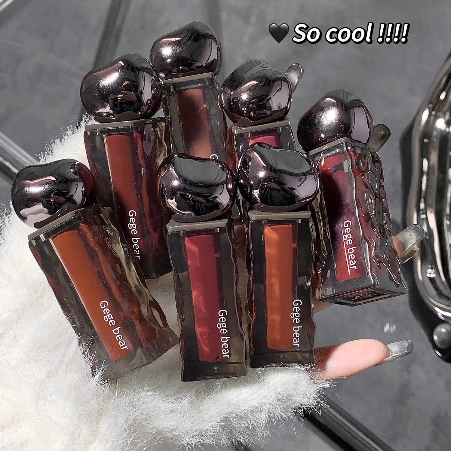 Glacier Lava Lip Lacquer lip gloss with water-light mirror finish in one of seven available colour shades