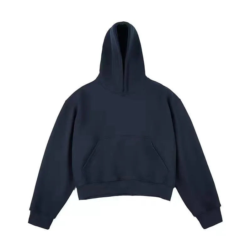 Man wearing a dark grey Chinese cotton composite hooded sweater with a removable hood and long sleeves.