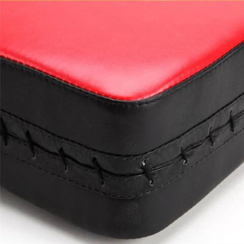 Blue and red vertical square foot boxing target props made of thickened PU material.