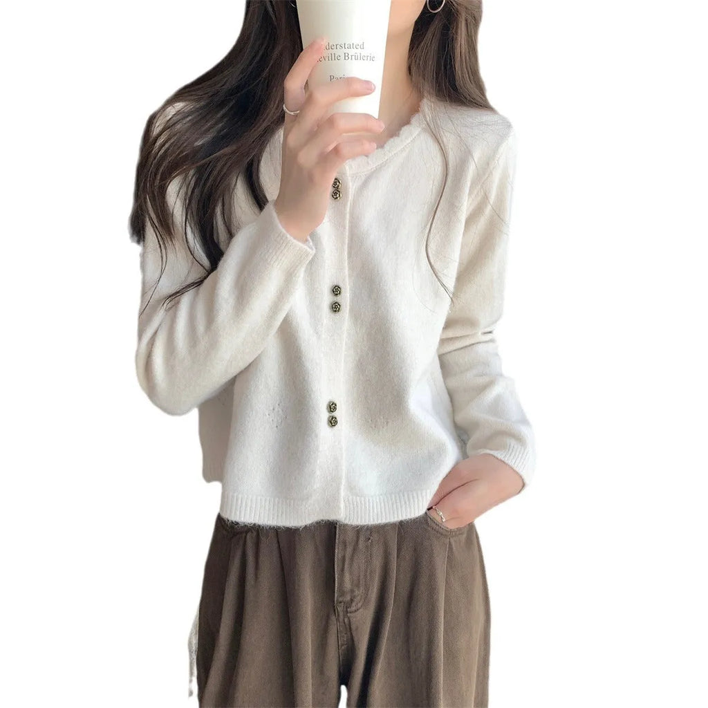 Women's long-sleeved acrylic cardigan sweater coat in free size, shown in a light colour.