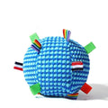 Blue and yellow vocal molar ball dog toy with textured surface and ring shape on a plain background.