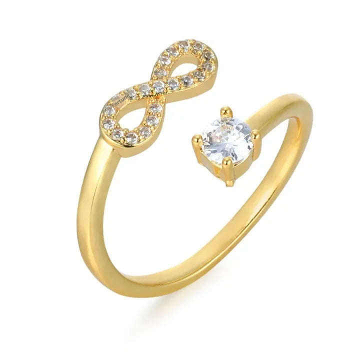 Geometric open ring with zircon stones showing letter personalisation options in gold rose silver colours