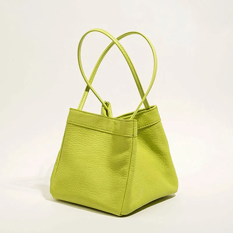 Cute small square bucket bag for women in textured PU, available in six solid colours including green and black.