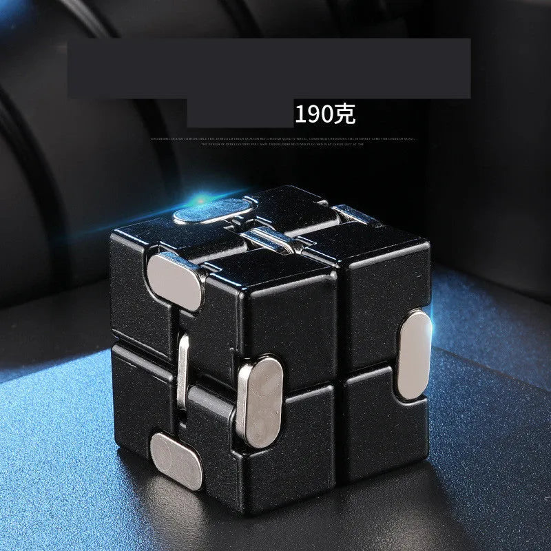 Zinc alloy infinity cube fidget toy showing rotating black cubes in 4cm metal construction