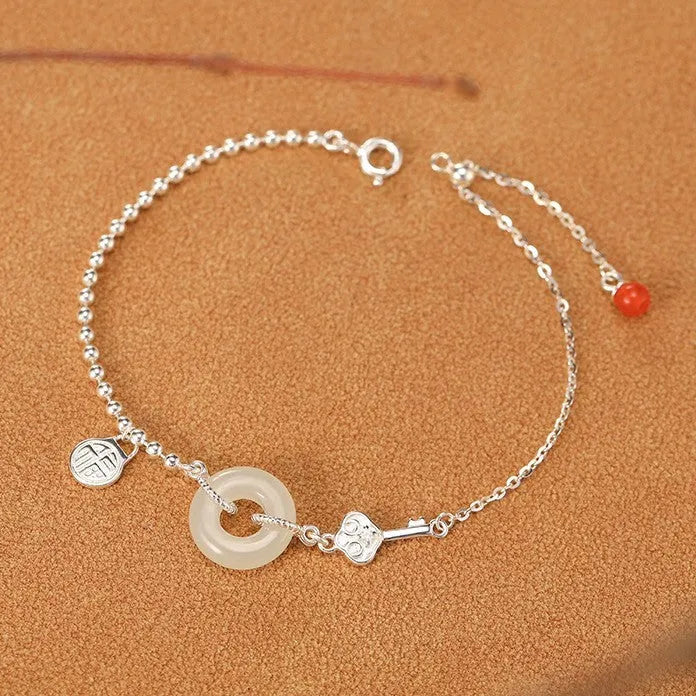 Women's 925 silver Hetian jade bracelet with Chinese geometric design and peace buckle