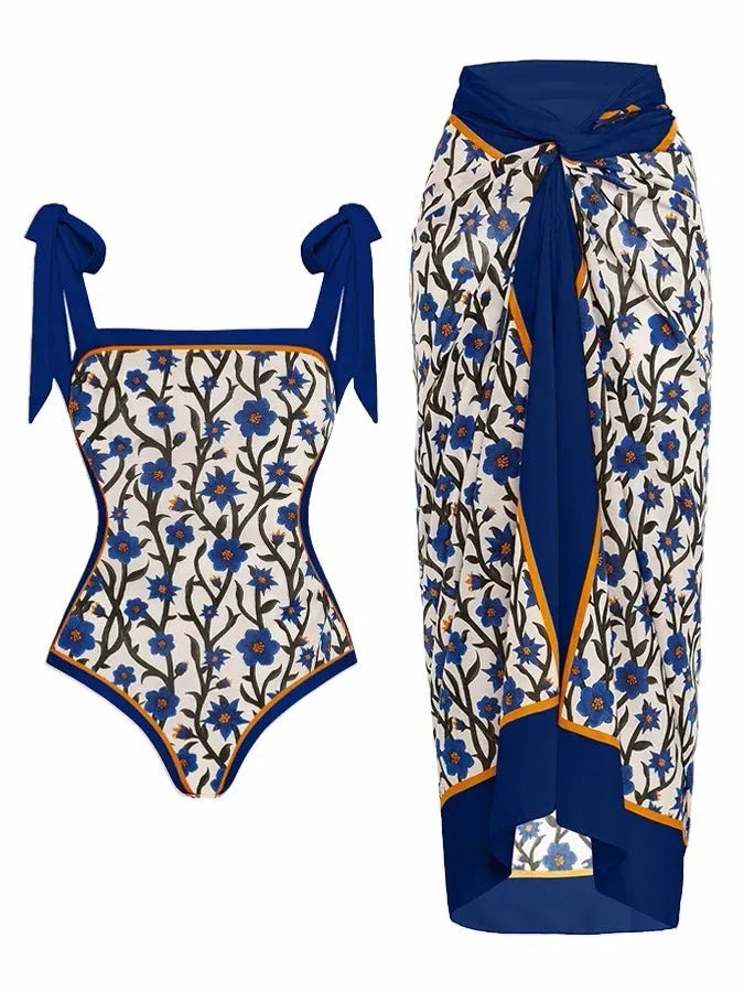 Women's printed chiffon two-piece swimsuit with attached hip skirt in a floral pattern.