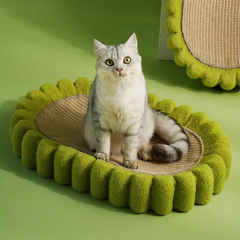Green oval cat scratch pad bowl bed made from sisal measuring 650mm by 420mm