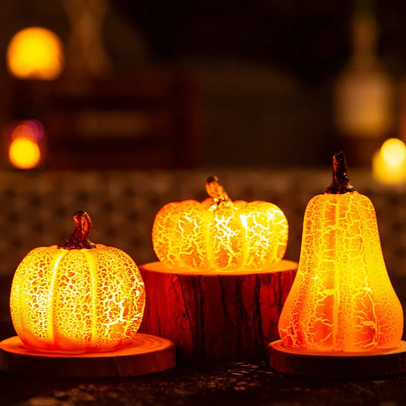 Three Halloween pumpkin lanterns in short, medium, and long sizes with LED illumination and realistic surface cracks