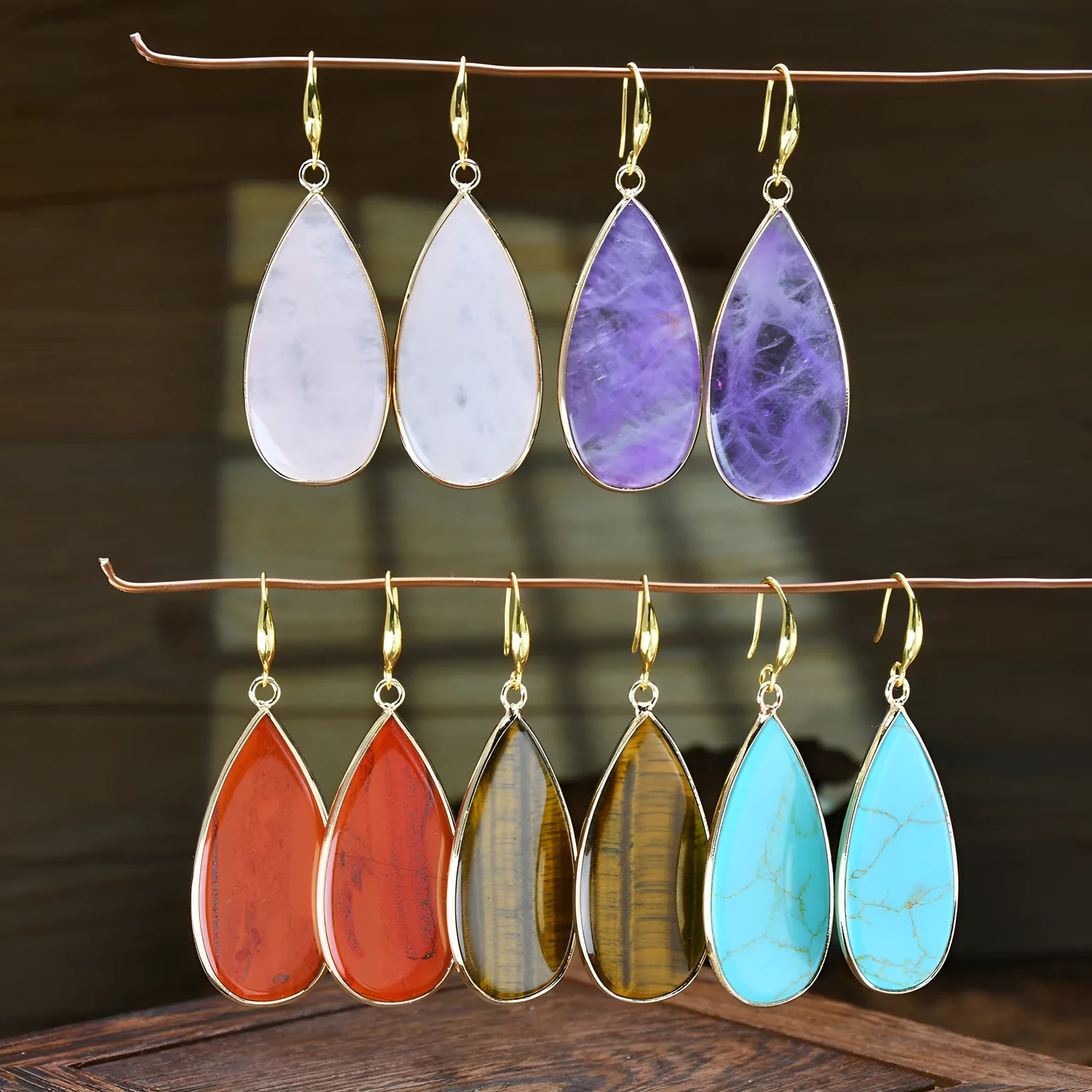 Vintage long water drop stone earrings in tigereye colour with retro styling