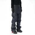 A pair of dark blue loose-fit straight leg jeans on a neutral background.