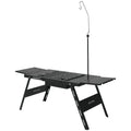 Black folding steel barbecue table with grill, shown in round and square top styles.