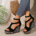 Women's cream white ankle-strap sandals with a buckle, thick rubber sole, and fish mouth scaffold design.