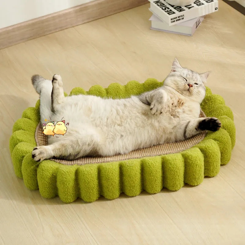 Green oval cat scratch pad bowl bed made from sisal measuring 650mm by 420mm