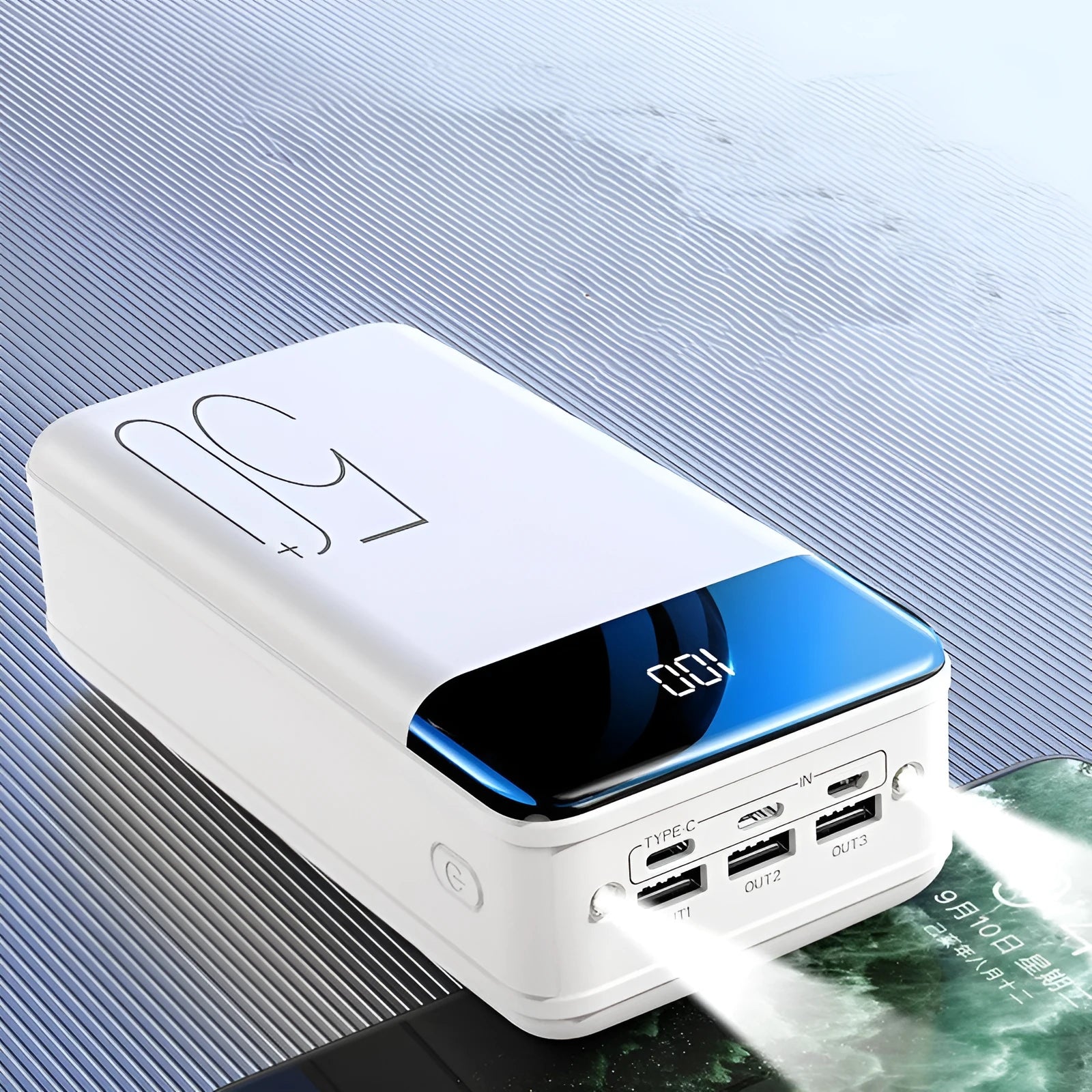 Large black or white 50000mAh power bank showing multiple USB ports on front.