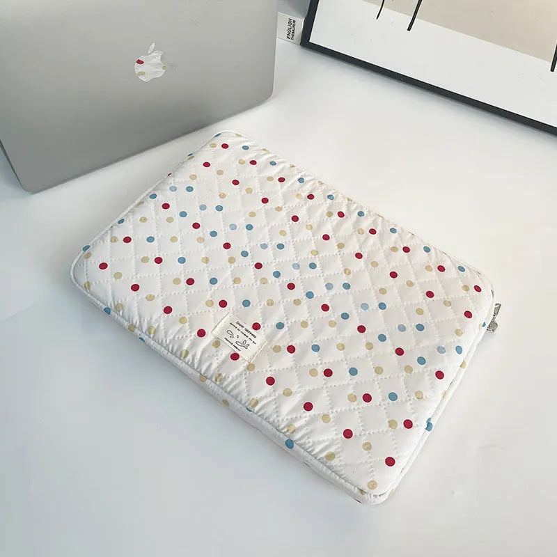 Women's polka dot polyester laptop bag shown in solid colour, suitable for 11-inch to 15.6-inch devices.