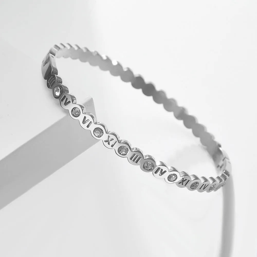 Korean style titanium steel bracelet showing gold rose gold and steel colour options with number decoration