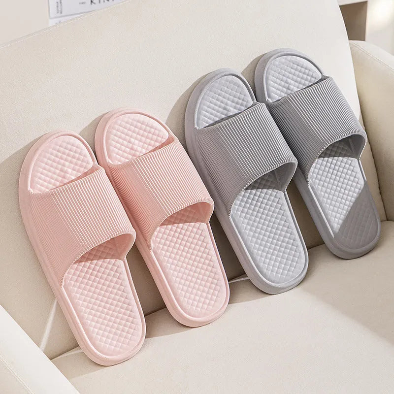 Pair of solid colour rhombus striped non-slip EVA foam indoor slippers