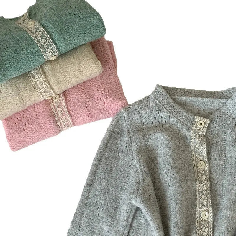 Loose fit artistic retro cardigan in viscose fibre shown in apricot colour.