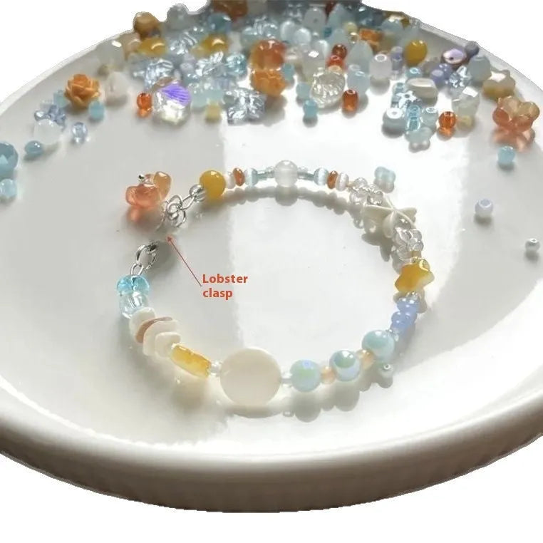 Orange water-soaked alloy bracelet with diamond shape and round elements for summer seaside styling