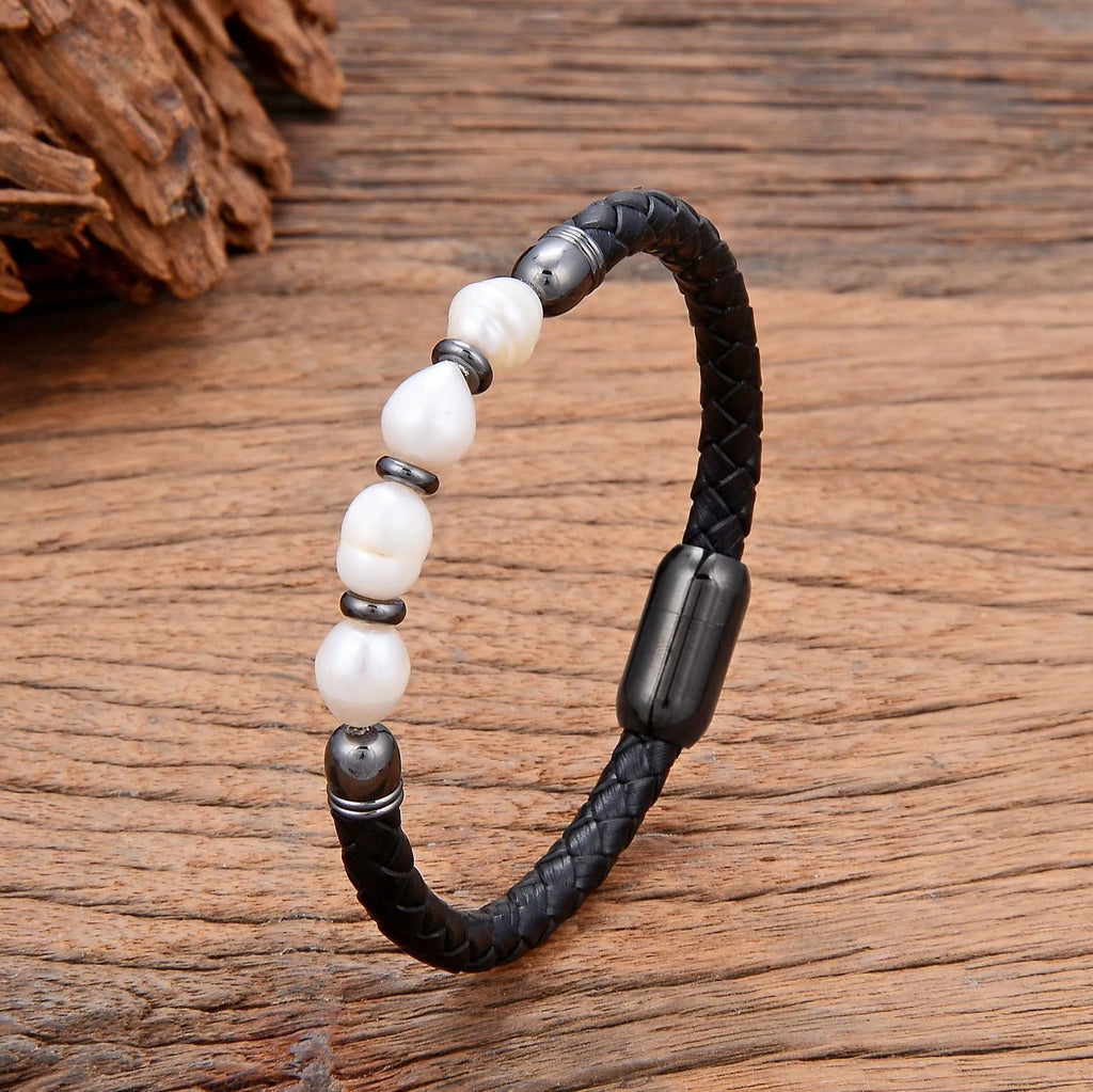 Handmade unisex bracelet with irregular pearls on adjustable leather strap in grey pearl and black.