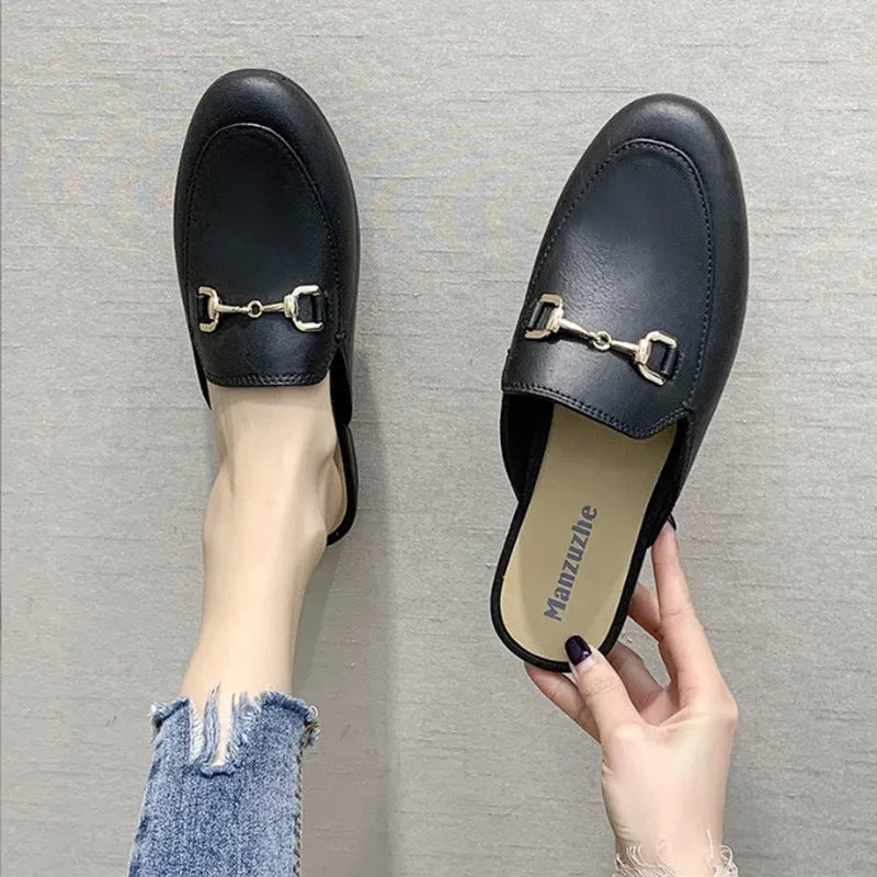 Women's PVC closed-toe half slippers with metal buckle in choice of colours.