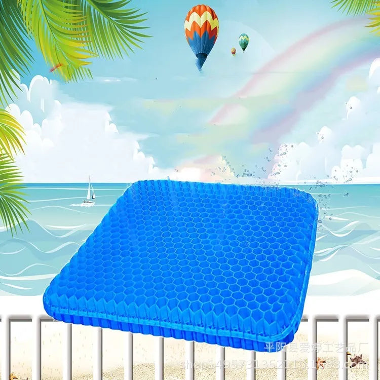 A solid-colour gel seat cushion with a honeycomb pattern, shown on a chair.